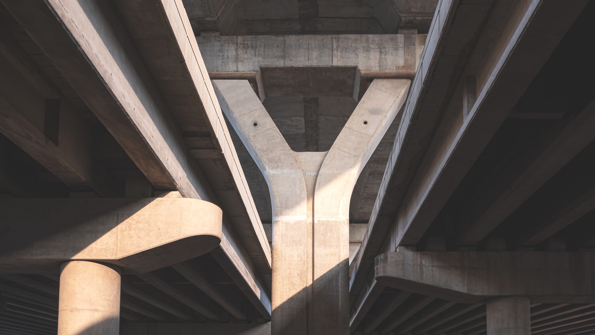 Concrete foundation structure of flyover and expressway with light and shadow on surface